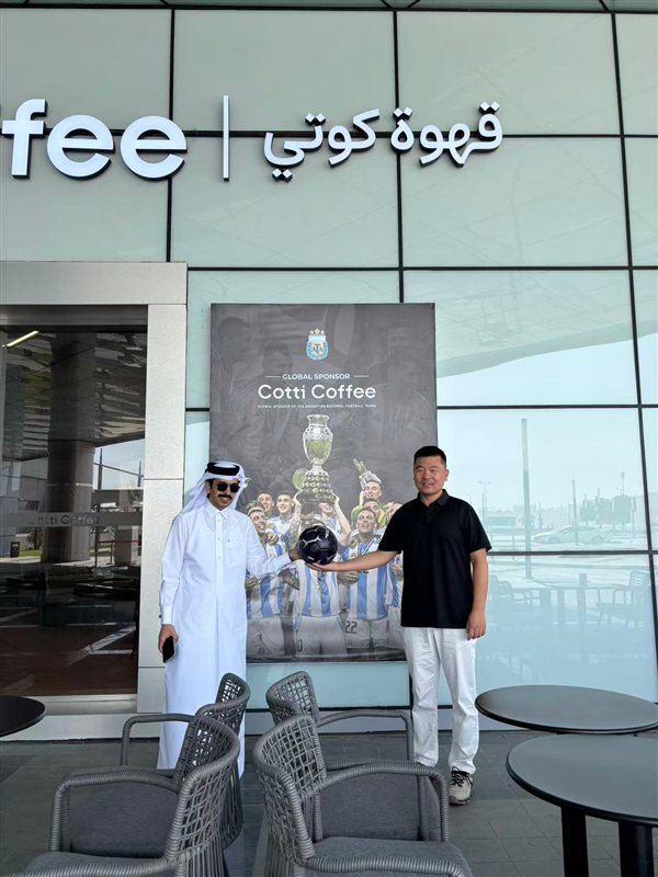 Founder with Qatari partner at Cotti Coffee Qatar